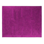 A vibrant magenta area rug with a modern geometric pattern, perfect for enhancing a contemporary dining room. This large wool rug adds a stylish touch to formal dining room settings, making it an ideal choice for dining room carpets.