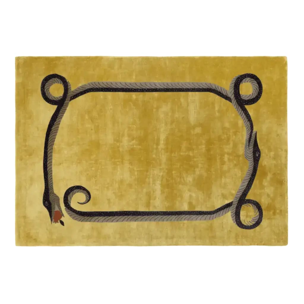 Top view of the Magic Snake Gold Lush Hand Tufted Wool Rug, a luxurious area rug perfect for large living rooms or office spaces. This vintage wool rug features an intricate snake design on a rich gold background, adding elegance to any living room or office decor.