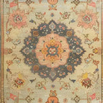 This beautiful area rug features an intricate floral design with a vintage Persian style, perfect for adding a touch of elegance to any living room. The hand-knotted patterns in soft, earthy tones create a timeless look that complements a variety of decor styles.