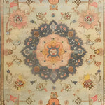 This beautiful area rug features an intricate floral design with a vintage Persian style, perfect for adding a touch of elegance to any living room. The hand-knotted patterns in soft, earthy tones create a timeless look that complements a variety of decor styles.