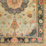 Close-up view of a magnificent floral hand-knotted area rug, showcasing intricate vintage Persian rug designs with vibrant floral patterns. Perfect for adding elegance to living room spaces, this rug exemplifies the beauty of classic area rugs for living rooms.