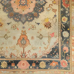 Close-up view of a magnificent floral hand-knotted area rug, showcasing intricate vintage Persian rug designs with vibrant floral patterns. Perfect for adding elegance to living room spaces, this rug exemplifies the beauty of classic area rugs for living rooms.