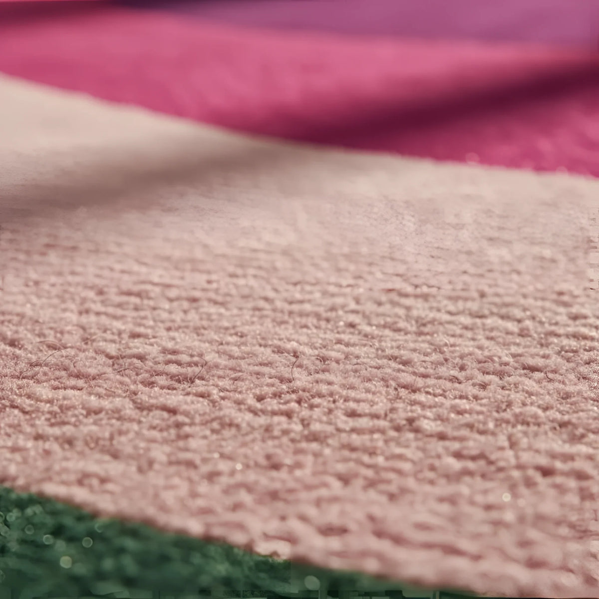 A vibrant and contemporary round rug crafted from wool, featuring a striking abstract design in shades of golden, pink, and purple. Perfect for adding a touch of modern elegance to a living room, this large area rug measures 8x10 and is ideal for those seeking stylish area rugs for living room spaces.