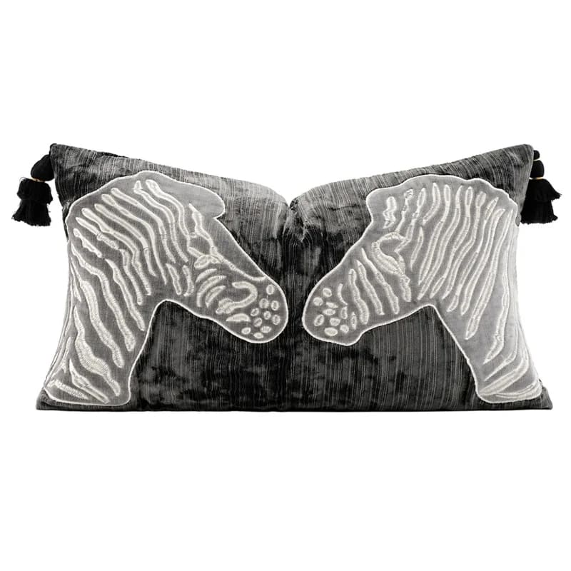 Luxurious black and gray throw pillow cover featuring embroidered zebra designs, perfect for adding a chic touch to any decor.