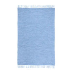 Top view of the Maia Jute and Cotton Blend Area Rug with Tassels, showcasing its elegant design and soft texture. Perfect for dining rooms, this large boho rug combines style and functionality, making it an ideal choice for those seeking jute rugs or dining room carpets.