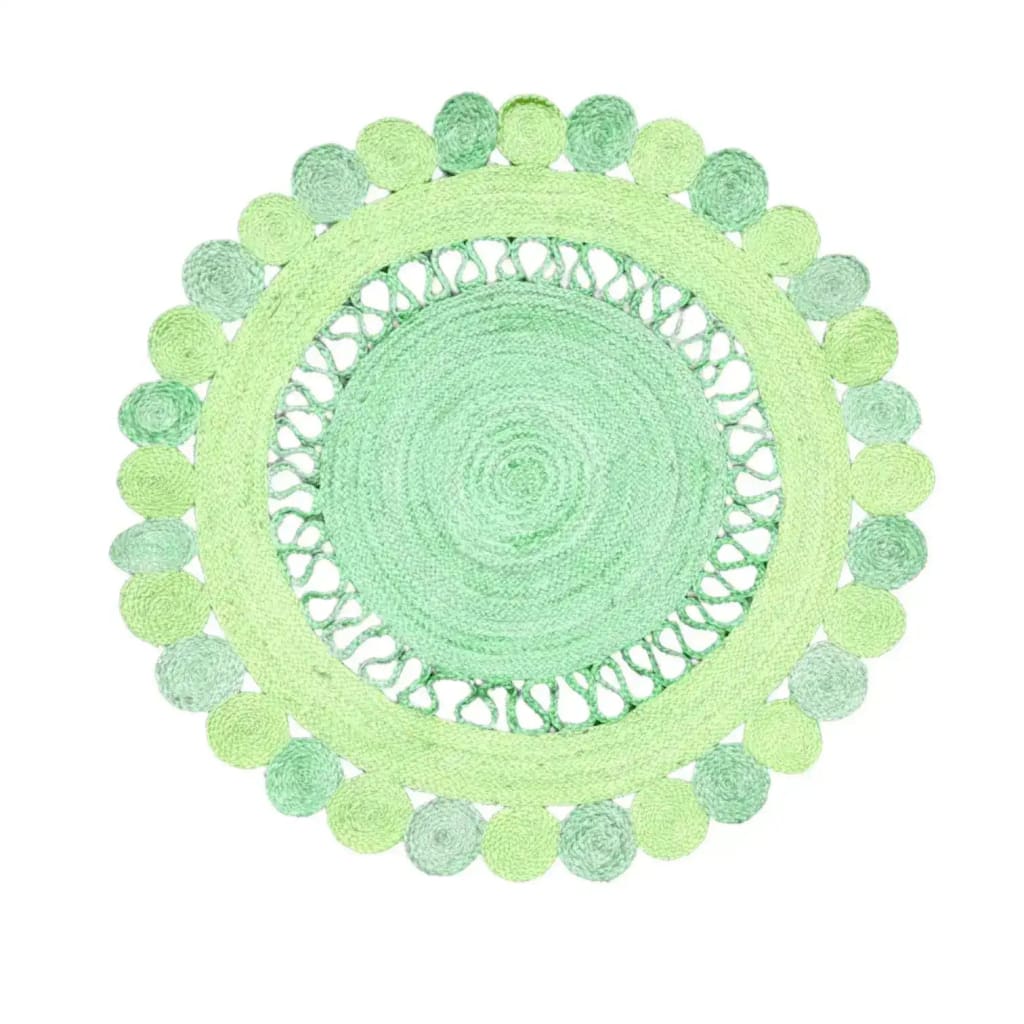 A beautiful Maia Round and Round Jute Rug in a refreshing green color, perfect as an area rug for living room spaces. This round jute rug features intricate woven patterns that add a touch of elegance to any home decor.