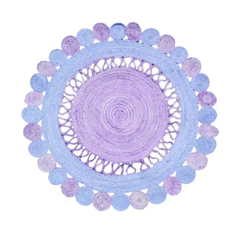 This is a top view of the Maia Round and Round Jute Rug in Light Blue, showcasing its intricate circular design. Perfect for adding a touch of elegance to any living space, this area rug is ideal for those seeking stylish rugs for the living room. The round rug's light blue hue offers a serene ambiance, making it a standout piece in large living room rugs collections.