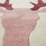 Close-up of a pink and white patterned rug