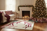 Cozy living room with Christmas decorations, including a tree, presents, and fireplace.