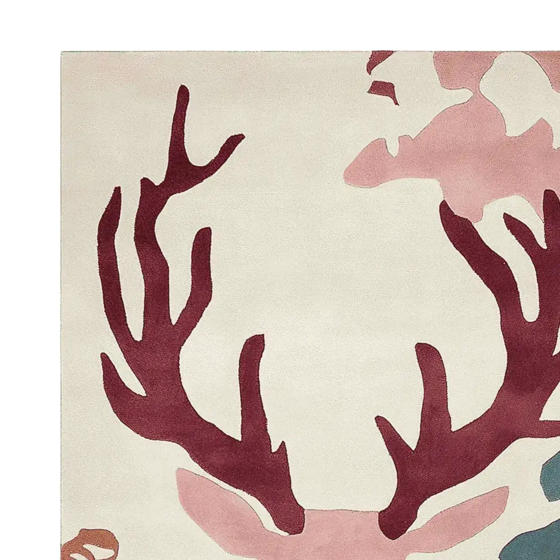 Close-up view of the Majestic Antler Hand Tufted Area Rug, showcasing its intricate wool design with abstract antler patterns in shades of red and pink. Perfect as a statement piece for living room rugs, particularly in an 8x10 size.