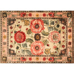 Majestic Blooms Hand Tufted Rug showcasing a vibrant floral design perfect for a large living room. This 8x10 vintage area rug features intricate wool detailing with bold red and pink flowers, adding elegance and charm to any living space.