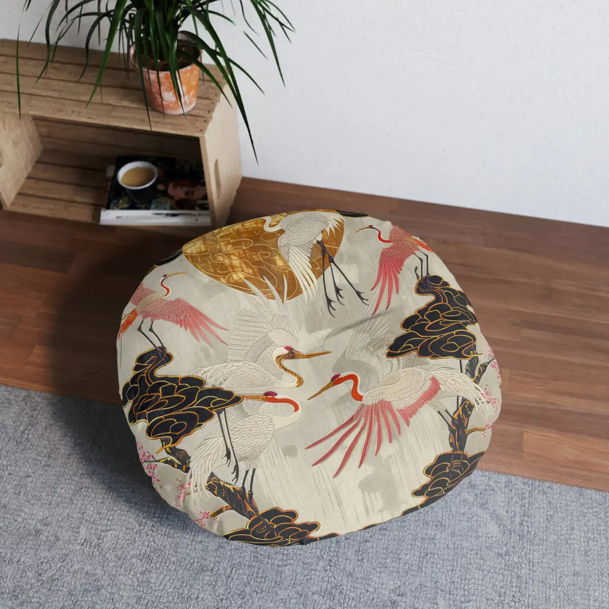 Majestic Crane and Cloud Pattern Floor Pillow on grey rug beside wooden shelf with plant slightly different overhead angle