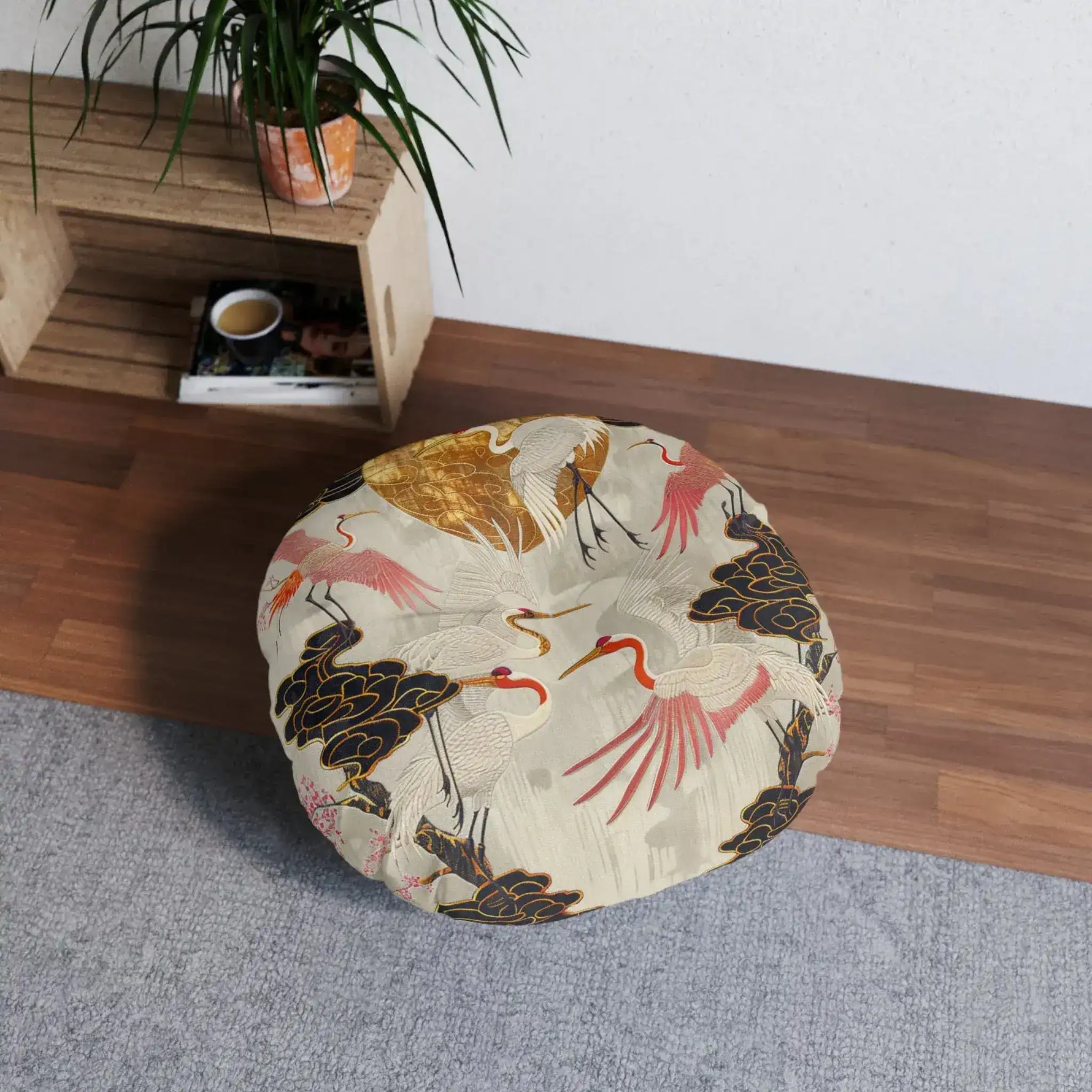 Majestic Crane and Cloud Pattern Floor Pillow in-room side view on grey rug beside wooden shelf with green plant