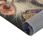 Rolled edge corner of Majestic Monarch Regal Monkey Accent Rug showing white fur texture and pink ear detail with gray backing