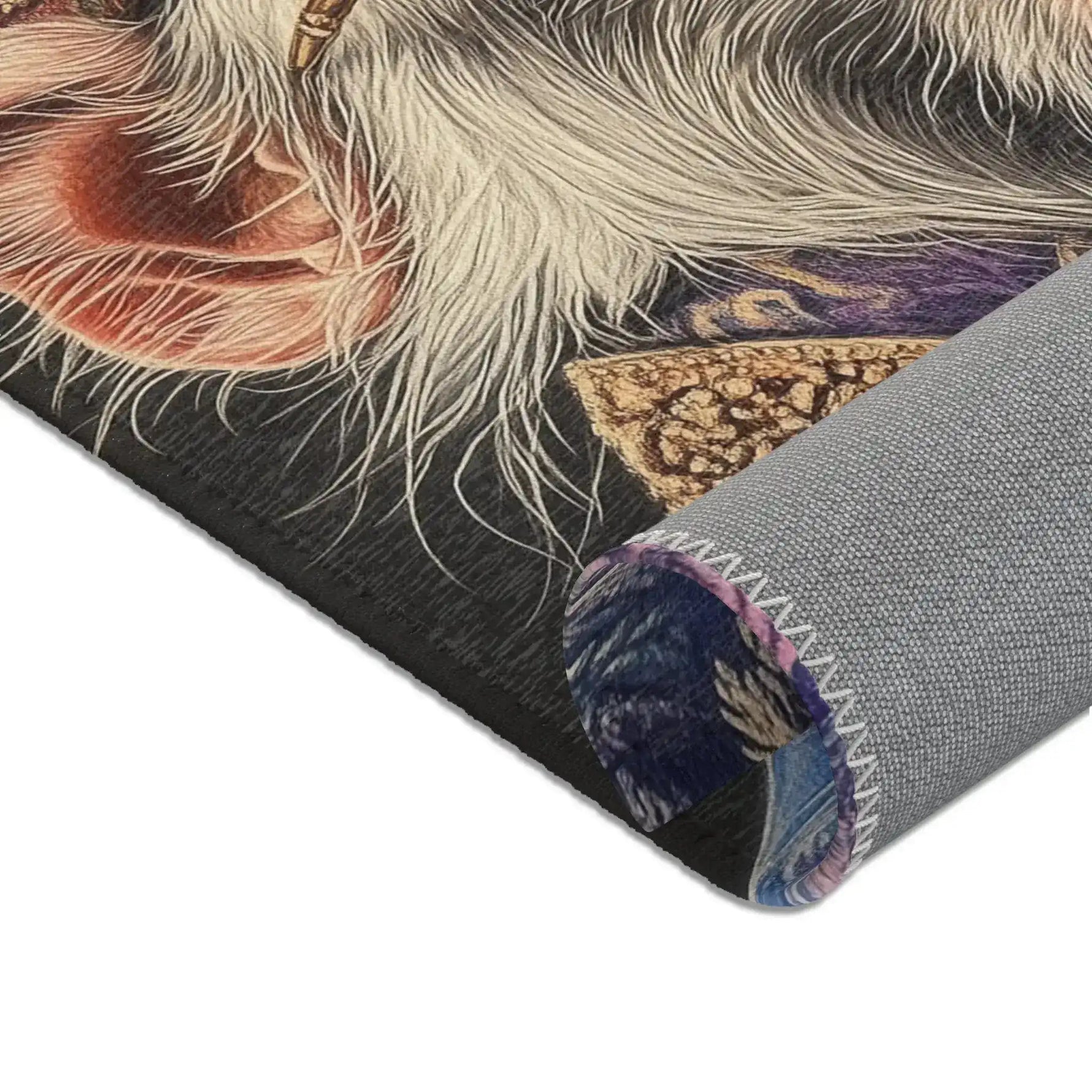 Rolled edge corner of Majestic Monarch Regal Monkey Accent Rug showing white fur texture and pink ear detail with gray backing
