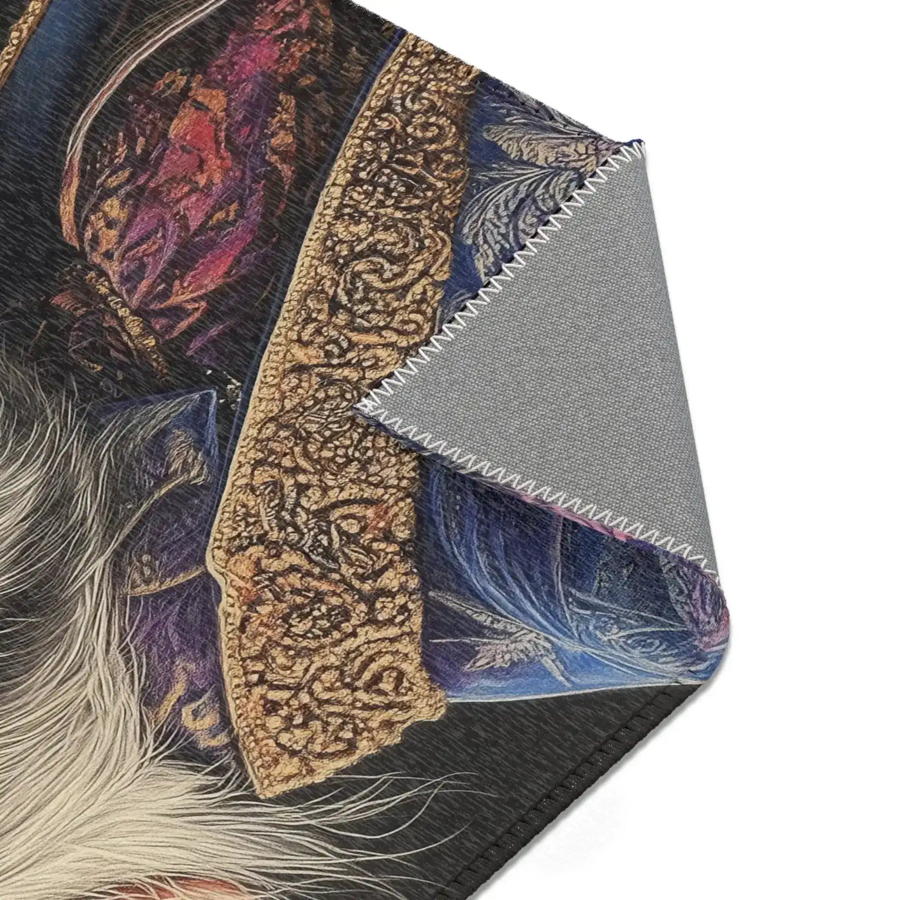 Corner fold of Majestic Monarch Regal Monkey Accent Rug showing ornate gold trim on dark background with white fur and gray backing