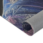Close-up rolled corner of Majestic Monarch Regal Monkey Accent Rug showing navy blue brocade with purple pink accents and gray backing