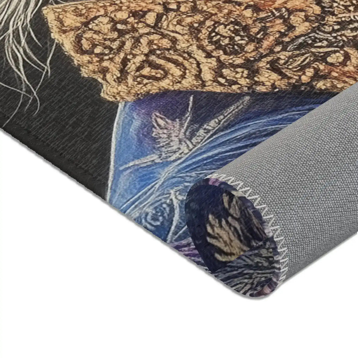 Rolled corner detail of Majestic Monarch Regal Monkey Accent Rug showing ornate crown and blue coat on dark background and gray backing