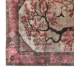 The Maple Meditations Knotted Wool Rug features a stunning floral design with intricate branches and leaves in shades of red and pink. This elegant area rug is ideal for enhancing large living room spaces, providing a vibrant and artistic touch to any decor. Perfect for those seeking living room area rugs that combine beauty and functionality.