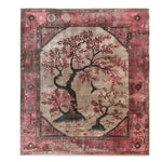 The Maple Meditations Knotted Wool Rug features a stunning floral design with intricate tree patterns in shades of red and black, set against a warm beige background. This elegant area rug is perfect for adding a touch of nature-inspired charm to your living room. Ideal for those seeking large living room rugs or floral rugs that blend art and comfort.
