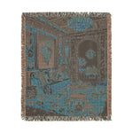 Back face of the Maximalist Dreamscape Woven Blanket with fringe showing teal brown woven reverse of opulent interior scene in square format