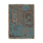 Back face of the Maximalist Dreamscape Woven Blanket with fringe showing teal brown woven reverse of opulent interior scene in portrait crop