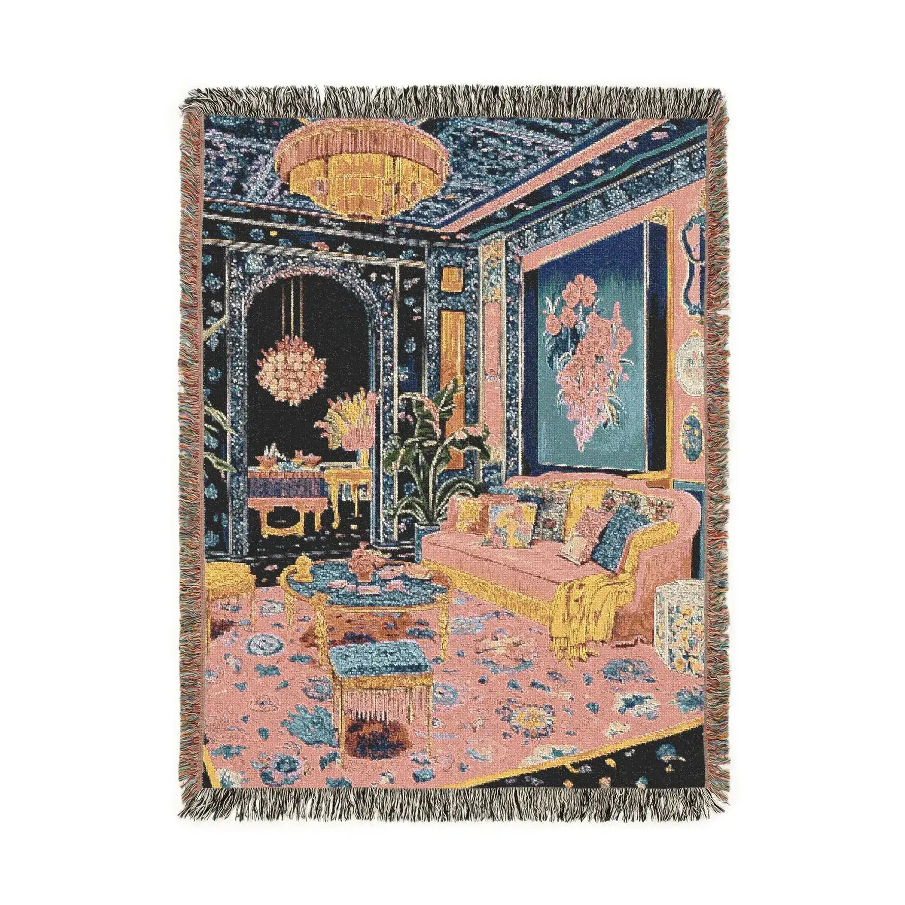 Portrait fringed woven throw showing opulent room with chandelier floral walls pink sofa and patterned carpet in navy and pink on the Maximalist Dreamscape Woven Blanket