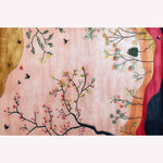 Beautiful Meadow Vista Hand Tufted Area Rug with a delicate floral and bird design on a soft pink background. Perfect as a dining table rug or for adding charm to your dining room. This wool rug is a stunning choice for those seeking large area rugs for living room elegance.