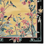 Vibrant area rug featuring a hand-tufted wool design with colorful birds and floral patterns, perfect for enhancing living room decor. Ideal for those seeking an 8x10 wool rug for a stylish and cozy living space.