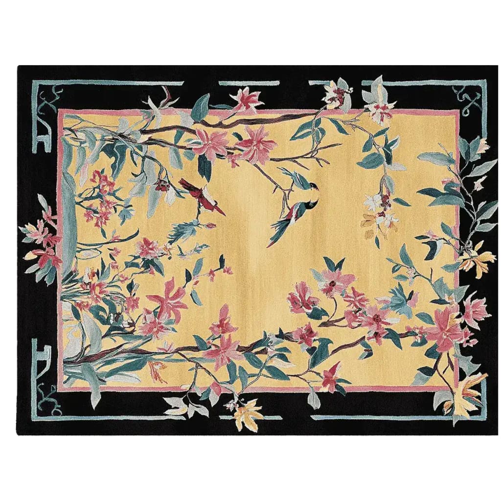 A beautifully hand-tufted area rug featuring an intricate floral design with birds. The rug showcases a vibrant mix of pink and green hues set against a warm yellow backdrop, bordered by a contrasting black frame. Ideal as a wool rug for the living room, this elegant 8x10 rug adds a touch of nature-inspired charm to any space.