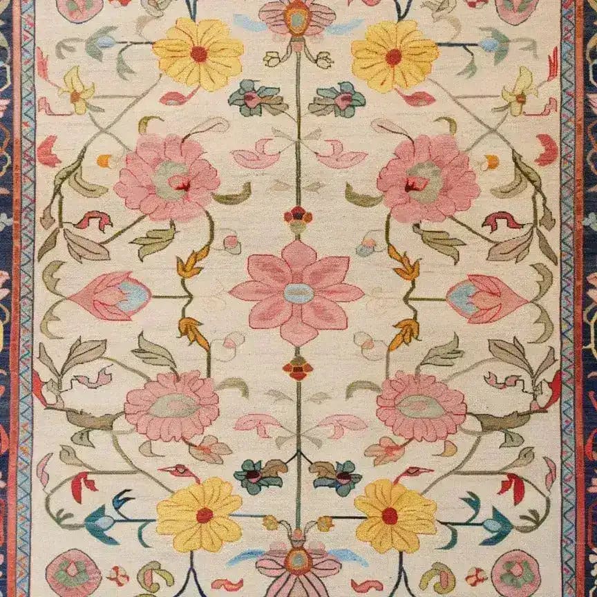 A beautifully detailed Medallion Bloom Hand Knotted Area Rug featuring vibrant floral patterns with pink, yellow, and blue flowers. This vintage rug is perfect for adding a touch of elegance to large living rooms. The intricate Persian design makes it an ideal choice for those seeking a floral rug or rugs for living room spaces.