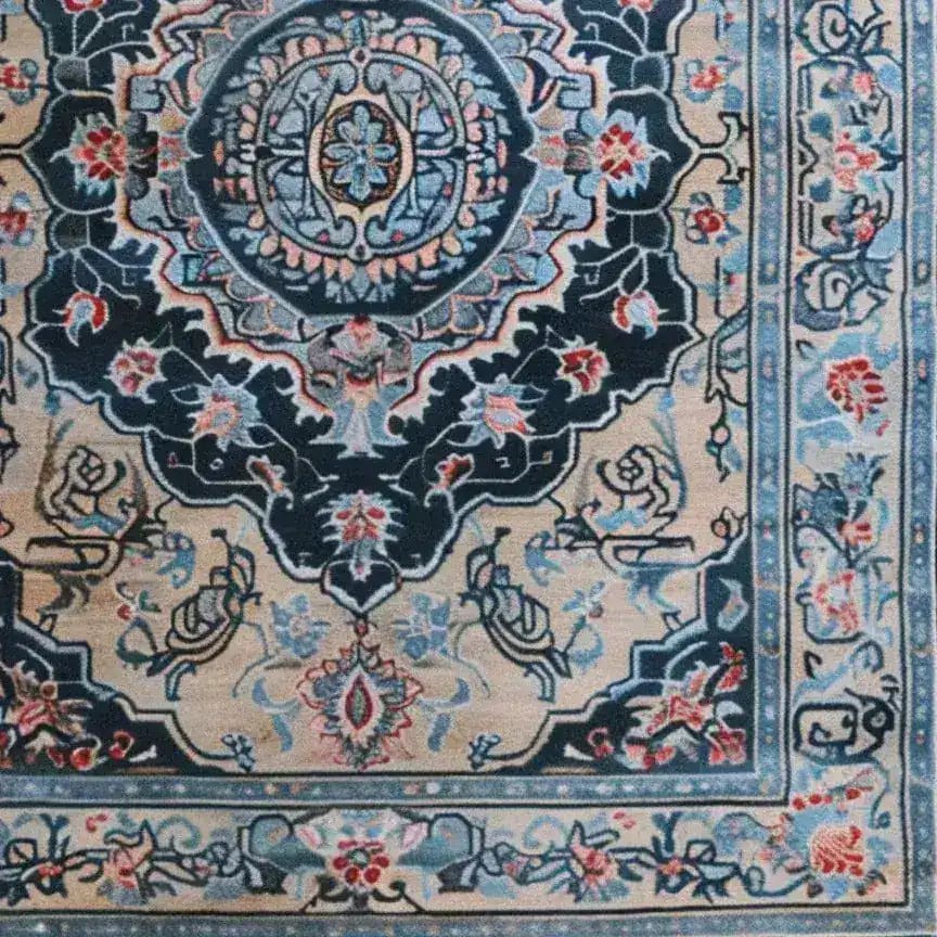 A detailed view of a Medallion Hand Tufted Area Rug, showcasing its intricate vintage Persian design. Perfect for dining rooms, large living rooms, or as a classic wool rug under a dining table, this elegant piece features ornate floral patterns and a rich color palette that adds sophistication to any living space.