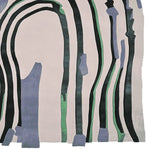 Area rug with an abstract design featuring bold stripes in black, green, and blue on a beige background, perfect as a contemporary wool rug for living rooms. This 8x10 rug adds a modern touch and artistic flair to any space.