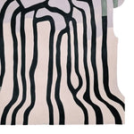 Top view of the Meltdown Map Hand Tufted Rug, featuring an abstract design with flowing black lines on a soft background. This contemporary wool area rug is perfect for adding a modern touch to any living room. Ideal for spaces needing an 8x10 size, this elegant rug enhances the aesthetic of living room area rugs with its unique style.
