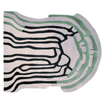 A stylish Area Rug featuring an abstract design in black and green on a light background. This contemporary rug is perfect for adding a touch of modern elegance to living room area rugs. Made from high-quality wool, this living room rug in an 8x10 size offers both durability and sophistication.