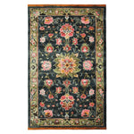 The Midnight Bloom Mosaic Hand Tufted Rug is a stunning area rug featuring a vibrant floral design. This wool rug displays intricate patterns of blooming flowers in rich colors, ideal for adding elegance to large living room spaces. It's a perfect choice for those seeking area rugs for living room decor.
