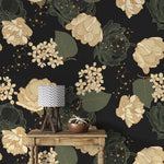 Midnight blooms wallpaper detail, cream peonies and hydrangea on black with rustic table and lamp
