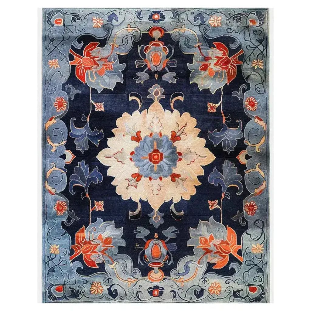 A beautifully hand-tufted Midnight Blossom Tapestry area rug featuring a vintage floral design. The rug displays intricate patterns with bold red and blue flowers against a deep navy backdrop. Ideal for adding elegance to living rooms and offices, this 8x10 wool rug combines classic charm with modern sophistication.