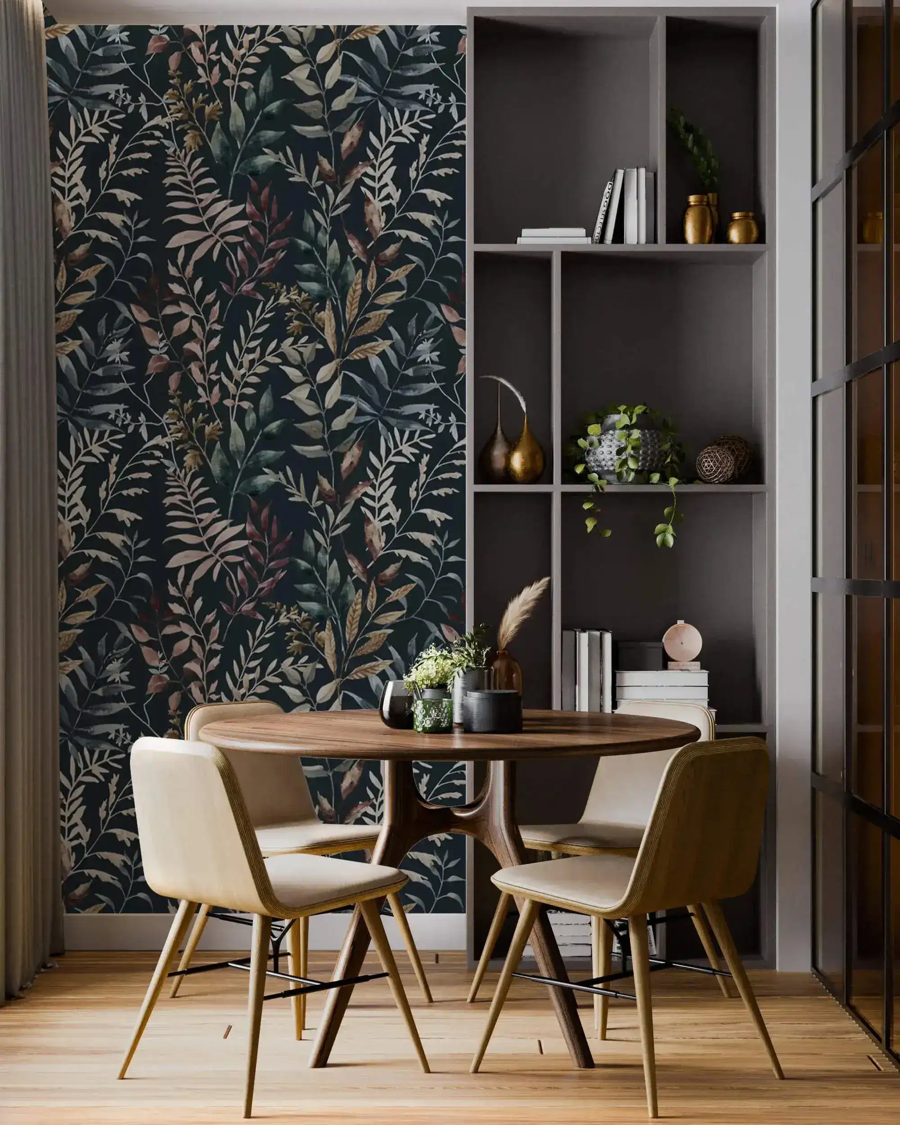 Midnight Botanical wallpaper with dark navy leaf pattern behind round dining table, beige chairs, and shelving unit.