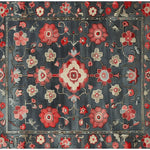 Elegant Midnight Floral Trellis Hand Tufted Area Rug featuring a vibrant red and pink floral pattern on a dark background. Perfect for adding a touch of sophistication to any dining room or living room. This square wool rug combines the timeless appeal of Persian rugs with a modern twist, ideal for dining room carpets or living room and dining room rugs.