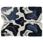 Stylish area rug featuring a contemporary abstract leaf design in dark and light tones. This wool rug is perfect for adding a modern touch to any living space. Ideal for use as an 8x10 living room rug, it showcases an artistic blend of colors and patterns.