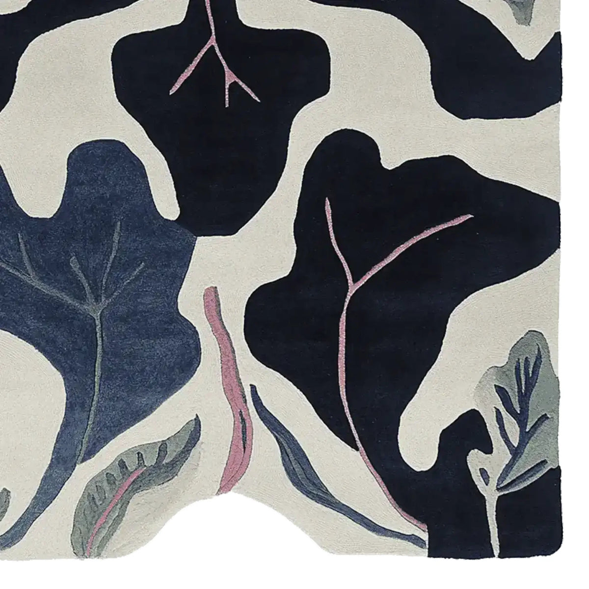 Top view of the Midnight Leaf Veins Hand Tufted Area Rug, showcasing its contemporary abstract design with bold black and blue leaf patterns on a cream background. This wool rug is perfect for adding a modern touch to living rooms, especially as a centerpiece among living room rugs 8x10.