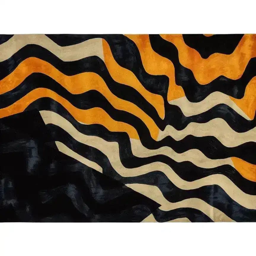 A striking Midnight Mirage Tufted Wool Rug featuring bold abstract waves in black, orange, and cream. This contemporary area rug is perfect for adding a modern touch to any living room with its vibrant design and large size, making it a standout wool rug choice for stylish interiors.