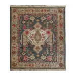 The Midnight Mosaic Hand Knotted Area Rug features an intricate vintage design with floral patterns and rich colors, ideal for enhancing the ambiance of any living room. This 8x10 Persian rug offers a timeless elegance that complements traditional and contemporary decor.