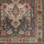Top view of the Midnight Mosaic Hand Knotted Area Rug, showcasing its intricate floral designs and vintage Persian motif in rich colors. Perfect for enhancing the elegance of living room spaces, especially in the popular 8x10 size.