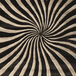 Top view of the Midnight Spiral Dance Hand Tufted Area Rug, showcasing its mesmerizing black and white spiral pattern. This contemporary wool rug is perfect for adding a touch of modern elegance to any living room.