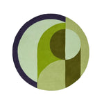 A stylish Mini Maia Geometric Round Hand Tufted Wool Rug featuring an abstract design with green and beige tones, perfect for large living rooms or offices. This area rug adds a modern touch to any space, enhancing the decor with its unique circular pattern.