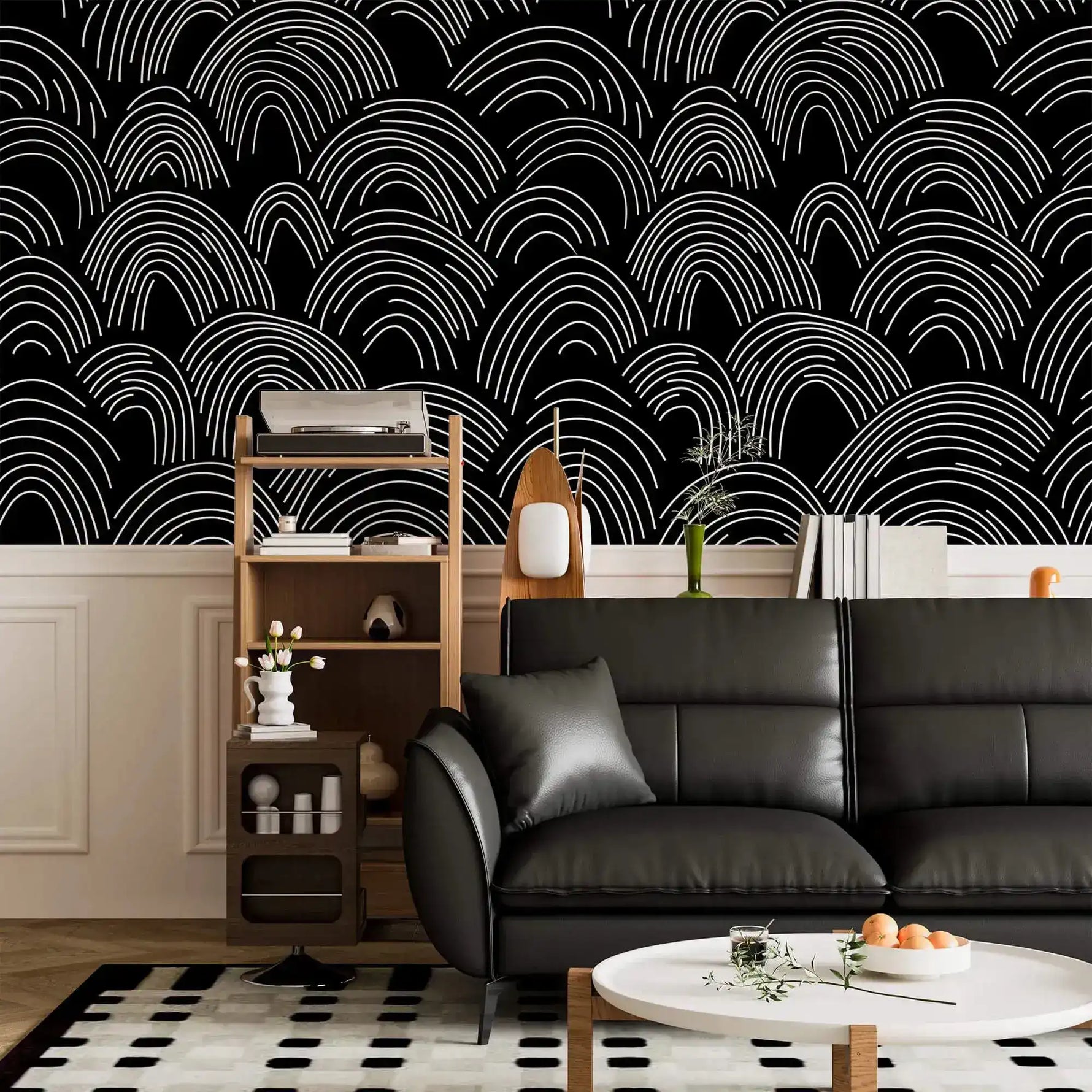 Minimalist Midnight Lines scallop-wave wallpaper over white panelling behind a black leather sofa