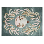 The Mistletoe Dreams Hand Tufted Area Rug features a soothing green background with elegant mistletoe designs and a central ornament motif, perfect for adding a cozy touch to your living room. This 8x10 wool rug brings warmth and style to any space, making it an ideal choice for those seeking beautiful rugs for living room decor.