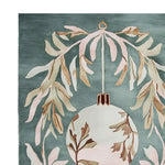 A beautifully detailed area rug featuring a festive design with intricate mistletoe leaves and a decorative ornament on a soft green background. This wool rug is perfect for adding a touch of elegance to your living room. Ideal as an 8x10 rug, it enhances any space with its warm and cozy appeal.